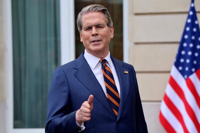US Treasury Secretary Scott Bessent addresses journalists during a press statement with US Trade Representative Jamieson Greer (unseen) following a new round of trade discussions with Chinese officials at the OECD Headquarters in Paris on March 16, 2026. China and the United States agreed that stable bilateral economic trade relations were beneficial to both countries and the world, China's International Trade Representative told reporters. (Photo by Ludovic MARIN / AFP)