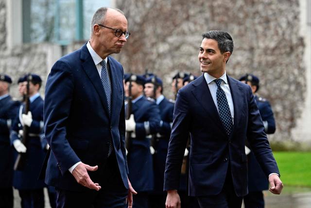 German Chancellor Friedrich Merz (L) and Netherlands' Prime Minister Rob Jetten are pictured during an official welcoming ceremony at the chancellery in Berlin, on March 16, 2026 (Photo by Tobias SCHWARZ / AFP)