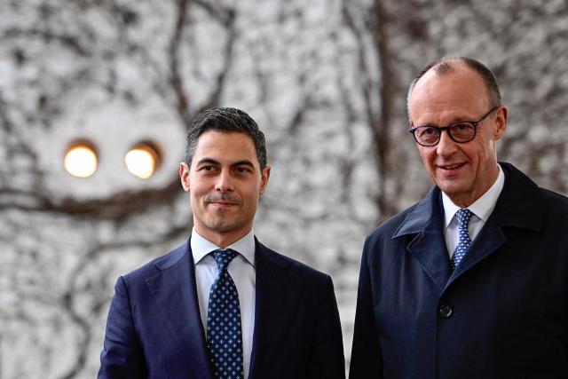 German Chancellor Friedrich Merz (R) greets Netherlands' Prime Minister Rob Jetten as he arrives at the chancellery in Berlin, on March 16, 2026 (Photo by Tobias SCHWARZ / AFP)