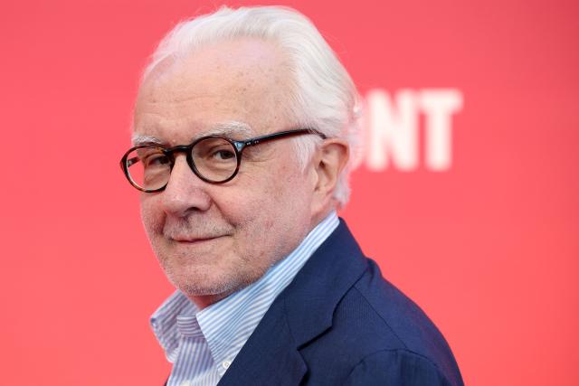 French chef Alain Ducasse poses upon arrival to attend the 2026 Michelin Guide award winners ceremony in Monaco on March 16, 2026. (Photo by Valery HACHE / AFP)
