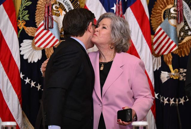 White House chief of staff Susie Wiles greets US House Speaker Mike Johnson before a lunch with the Kennedy Center Board members at the White House in Washington, DC, on March 16, 2026. (Photo by Annabelle GORDON / AFP)