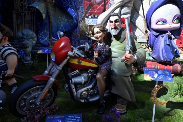 A picture taken on March 16, 2026 shows 'Ninots' (cardboard figurines) depicting Madrid regional president Isabel Diaz Ayuso (L) and Spain's far-right party Vox leader Santiago Abascal (R) during the Fallas festival in Valencia on March 16, 2026. Fallas are burned in the streets of Valencia every year on March 19 as a tribute to San Jose (Saint Joseph), patron saint of the carpenters' guild. The Fallas festival was added to UNESCO's intangible cultural heritage of humanity list in 2016. (Photo by JOSE JORDAN / AFP)