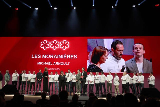 Michael Arnoult, chef at La Morainieres restaurant, delivers a speech after receiving his third star during the 2026 Michelin Guide award winners ceremony in Monaco on March 16, 2026. (Photo by Valery HACHE / AFP)