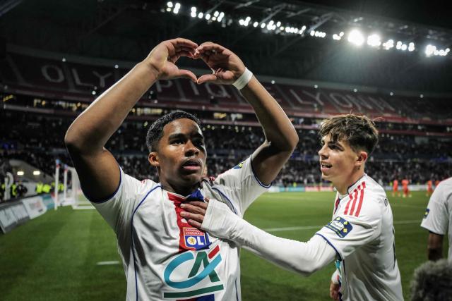 (FILES) Lyon’s Brazilian forward #09 Endrick celebrates celebrates scoring his team's first goal during the French Cup round of 16 football match between Olympique Lyonnais and Laval Stade Mayenne FC at Groupama Stadium in Lyon on February 4, 2026. Young striker Endrick, who has enjoyed a resurgence since joining Olympique Lyon on loan from Real Madrid, is the standout new addition to Brazil’s squad for this month’s friendlies against France and Croatia, head coach Carlo Ancelotti announced on March 16, 2026. (Photo by OLIVIER CHASSIGNOLE / AFP)