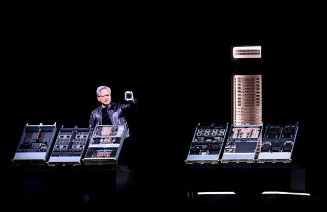 Nvidia CEO Jensen Hwang introduces Vera Rubin, a next-generation AI data center platform, and Rubin Ultra,  a next-generation AI GPU architecture, during the keynote address at the company's annual GTC developers conference in San Jose, California, on March 16, 2026. (Photo by JOSH EDELSON / AFP)