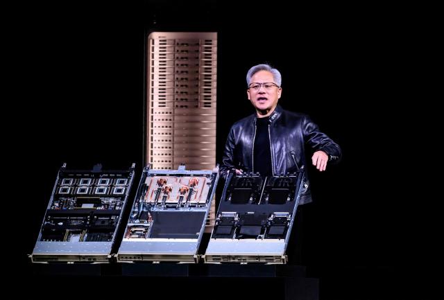 Nvidia CEO Jensen Hwang introduces Vera Rubin, a next-generation AI data center platform, and Rubin Ultra,  a next-generation AI GPU architecture, during the keynote address at the company's annual GTC developers conference in San Jose, California, on March 16, 2026. (Photo by JOSH EDELSON / AFP)