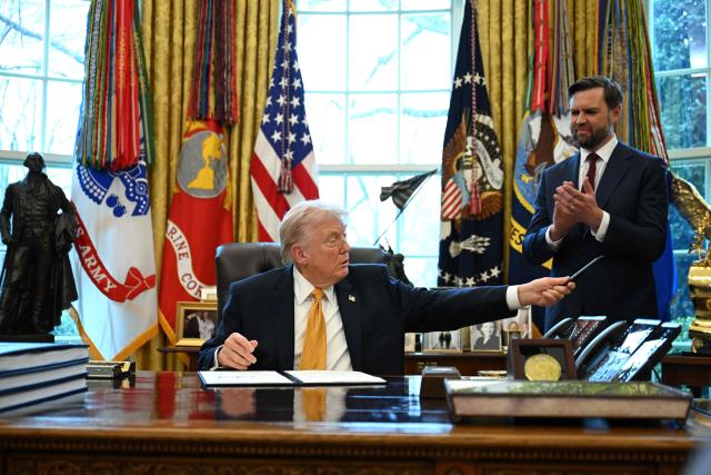 US Vice President JD Vance applauds after President Donald Trump signed an executive order on fraud in the Oval Office at the White House in Washington, DC, on March 16, 2026. (Photo by ANNABELLE GORDON / AFP)