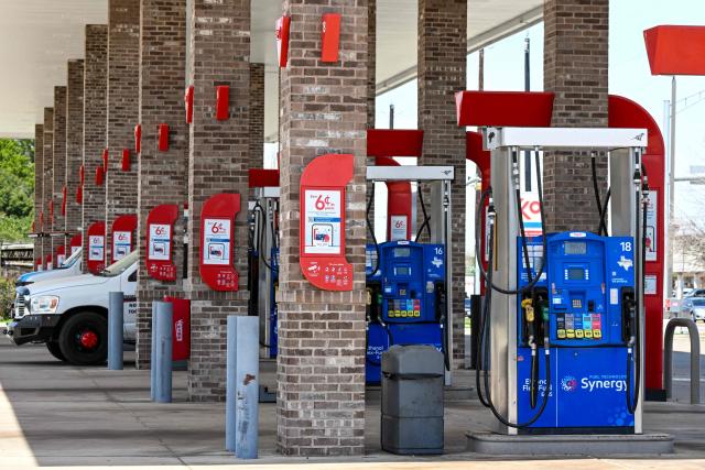 An Exxon gas station is seen in Houston, Texas, on March 16, 2026. Oil prices retreated and equities rose Monday as investors remained focused on the Strait of Hormuz, with US allies pushing back against President Donald Trump's demands to help reopen the key waterway to oil and natural gas tankers. (Photo by RONALDO SCHEMIDT / AFP)