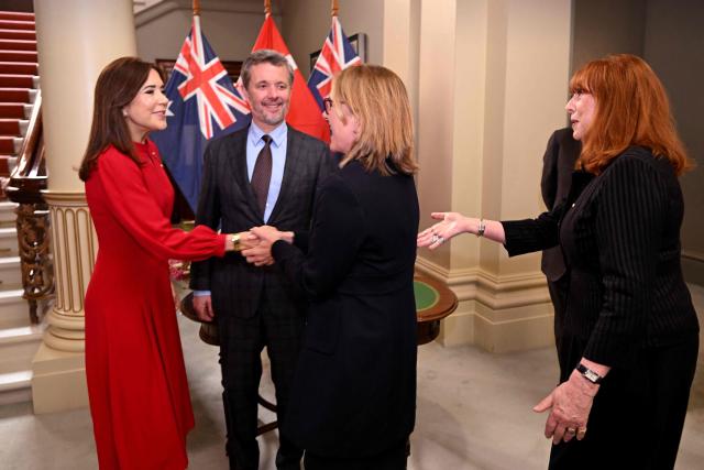 Denmark's King Frederik X (2/L) and Queen Mary (L) speak with Victoria's state premier Jacinta Allan (2/R) and Victoria's Governor Margaret Garner (R) after signing the guest book at Government House in Melbourne on March 17, 2026. (Photo by William WEST / POOL / AFP)