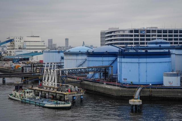 An oil tanker is moored at an oil terminal in Yokohama, Kanagawa prefecture on March 17, 2026. Oil prices resumed their push higher on March 17 as several countries pushed back against Donald Trump's demand that they help secure the key Strait of Hormuz, while Iran continued to target crude-producing neighbours. (Photo by Yuichi YAMAZAKI / AFP)