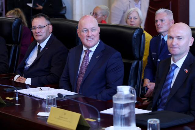 New Zealand's Prime Minister Christopher Luxon (C) holds bilateral talks with Tongan Prime Minister Lord Fatafehi Fakaf?nua in Nuku’alofa, Tonga, on March 17, 2026. (Photo by Ben STRANG / AFP)