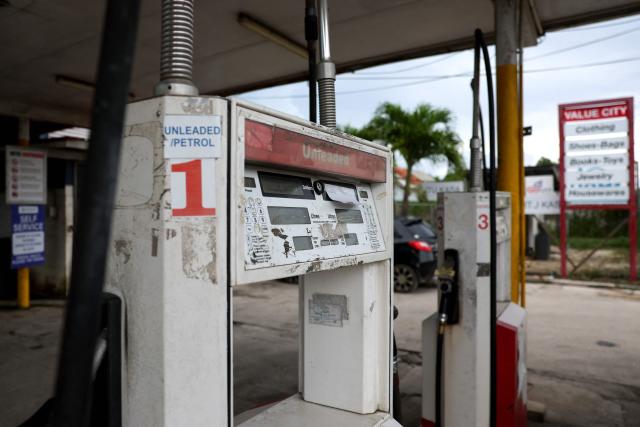 A fuel pump for unleaded petrol is seen at a petrol station in Nuku’alofa, Tonga on March 17, 2026. (Photo by Ben STRANG / AFP)