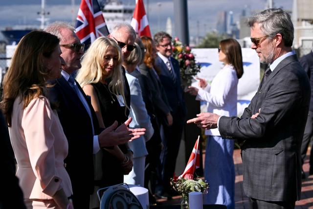 Denmark’s King Frederik X (R) and Queen Mary (2nd R) meet representatives from renewable energy companies with the Danish business delegation at the Port of Melbourne on March 17, 2026, as part of their five-day state visit to Australia. (Photo by William WEST / POOL / AFP)