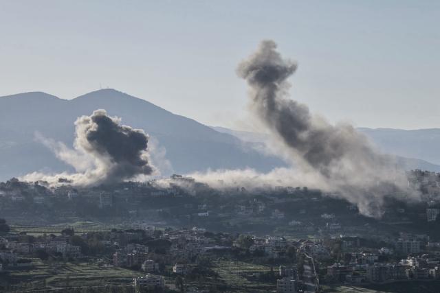 Smoke rises from the site of an Israeli airstrike that targeted an area in the southern Lebanese border village of Khiam on March 17, 2026. Israel launched a wave of strikes on Tehran and Beirut on March 17, while attacks in Baghdad drew neighbouring Iraq deeper into the Middle East war that has sparked economic turmoil across the globe. (Photo by AFP) / 