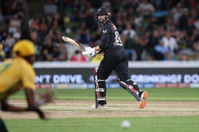 New Zealand’s Devon Conway plays a shot during the second Twenty20 international cricket match between New Zealand and South Africa played at Seddon Park in Hamilton on March 17, 2026. (Photo by Michael Bradley / AFP)