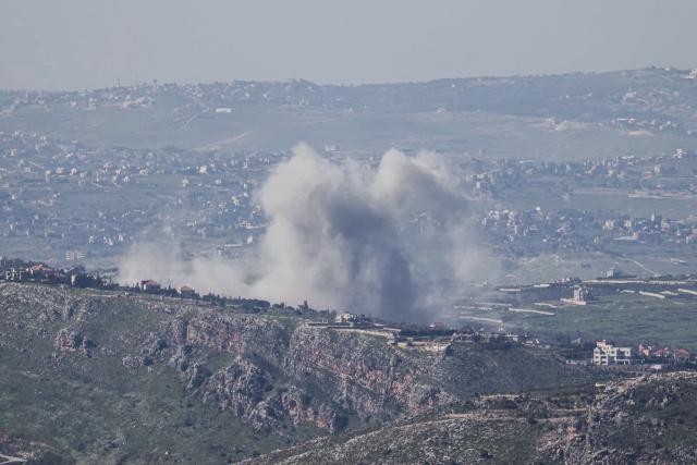 Smoke rises from the site of an Israeli airstrike that targeted an area in the southern Lebanese village of At Taybeh on March 17, 2026. Israel launched a wave of strikes on Tehran and Beirut on March 17, while attacks in Baghdad drew neighbouring Iraq deeper into the Middle East war that has sparked economic turmoil across the globe. (Photo by AFP) / 