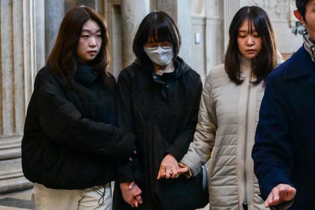 The mother of murdered Japanese student Narumi Kurosaki, Taeko Kurosaki (C), accompanied by family members arrive at the Lyon criminal court for the third trial of Chilean national Nicolas Zepeda accused of 2016 murder of his Japanese ex-girlfriend, in Lyon, central-eastern France, on March 17, 2026. Nicolas Zepeda was convicted in both the first instance and on appeal for the murder of his Japanese ex-girlfriend Narumi Kurosaki. (Photo by OLIVIER CHASSIGNOLE / AFP)