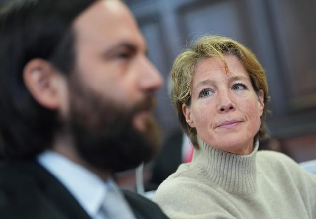 Defendant German entrepreneur and gastronome Christina Block (R) and her lawyer Ingo Bott wait for the continuation of the trial over alleged child abduction at the District Court in Hamburg, northern Germany, on March 17, 2026. The public prosecutor's office accuses Block, heiress of a steakhouse chain, of ordering the abduction of her daughter, born in 2010, and her son, born in 2013. According to the indictment, the background to this is an escalating custody dispute over many years between Block and her former husband, who have four children together. (Photo by Marcus Brandt / POOL / AFP)