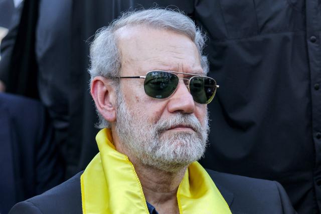 (FILES) Iran's security chief Ali Larijani attends a ceremony by the Lebanese Shiite movement Hezbollah marking the first anniversary of Israel's assassination of their longtime leader Hassan Nasrallah, in Beirut's southern suburbs on September 27, 2025. Israeli Defence Minister Israel Katz said on March 17, 2026, that Iran's powerful national security chief Ali Larijani was "eliminated last night", along with the commander of Tehran's Basij paramilitary force. (Photo by Anwar AMRO / AFP)