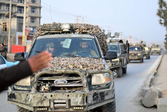 Taliban security personnel arrive in a convoy, after Pakistani airstrikes hit the Omid Addiction Treatment Hospital in Kabul, on March 17, 2026. The Afghan government on March 17 said that about 400 people were killed in a Pakistani airstrike on a drug rehabilitation centre in the capital, Kabul, in the deadliest attack in the recent violence between the two neighbours. (Photo by Wakil KOHSAR / AFP)