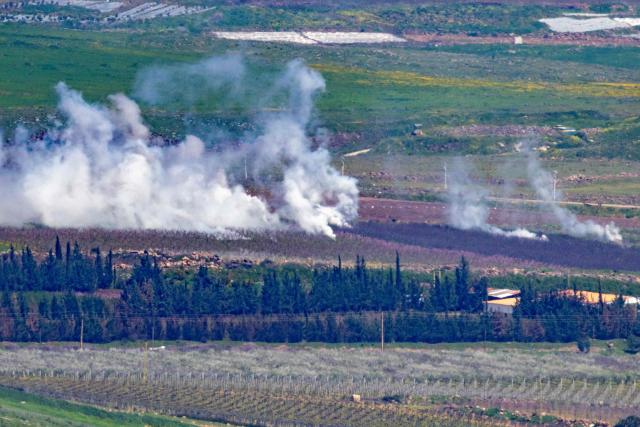 Smoke rises after an impact in southern Lebanon on the border with Israel as seen from the Upper Galilee in northern Israel on March 17, 2026. The Lebanese military said on March 17, that an Israeli strike on a car and a motorcycle in southern Lebanon killed one of its soldiers and wounded four others. Israel has stepped up strikes and deployed ground troops to its northern neighbour since March 2, when Lebanon was dragged into the wider war in the Middle East after Tehran ally Hezbollah attacked Israel with rockets in retaliation for the killing of Iranian supreme leader. (Photo by Odd ANDERSEN / AFP) / 