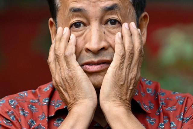 Environmental activist and former detainee Sonam Wangchuk reacts as he addresses a press conference in New Delhi on March 17, 2026, days after his release from jail. Prominent Indian activist Wangchuk on March 17 called for fresh dialogue with the Narendra Modi government, just days after officials ended his detention over deadly protests in the Himalayan region of Ladakh. (Photo by Arun SANKAR / AFP)