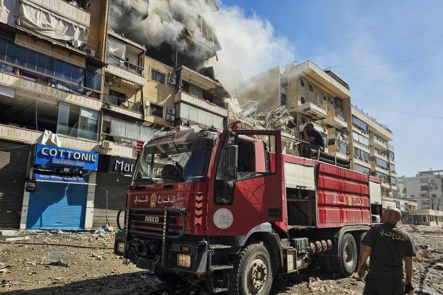 Firefighters work at the site of an Israeli airstrike in the southern suburbs of Beirut on March 17, 2026. Israel has stepped up strikes and deployed ground troops to its northern neighbour since March 2, when Lebanon was dragged into the wider war in the Middle East after Tehran ally Hezbollah attacked Israel with rockets in retaliation for the killing of Iranian supreme leader Ali Khamenei. (Photo by AFP) / 