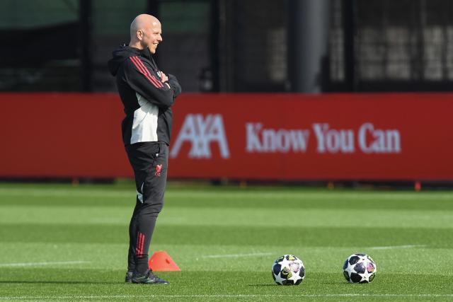 Liverpool's Dutch manager Arne Slot smiles during a team training session at their training ground in Kirkby, Liverpool, north-west England on March 17, 2026, on the eve of their UEFA Champions League, last 16 second leg football match against Galatasaray. (Photo by PETER POWELL / AFP)