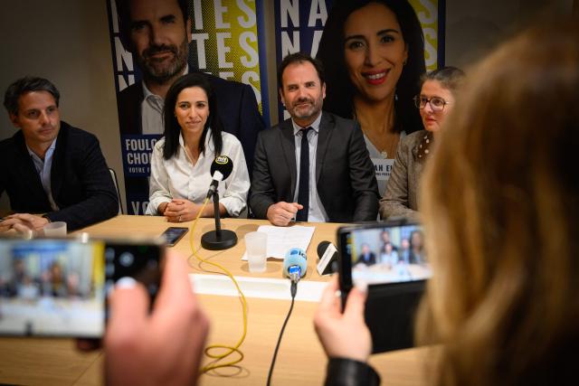 Les Republicains (LR) right wing party candidate for Mayor of Nantes, Foulques Chombart de Lauwe (C-R) and France's high commissioner for children Sarah El Hairy (C-L) attend a press conference a few days before the second round of France's 2026 municipal elections in Nantes, western France on March 17, 2026. (Photo by Loic VENANCE / AFP)