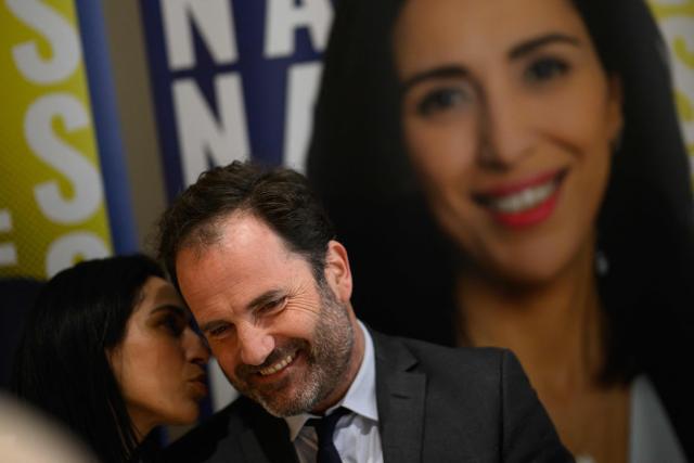 Les Republicains (LR) right wing party candidate for Mayor of Nantes, Foulques Chombart de Lauwe (R) and France's high commissioner for children Sarah El Hairy attend a press conference a few days before the second round of France's 2026 municipal elections in Nantes, western France on March 17, 2026. (Photo by Loic VENANCE / AFP)