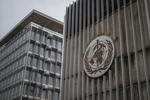 (FILES) This photograph shows a logo of the World Health Organisation (WHO) displayed on the facade of organisation's headquarters in Geneva on April 23, 2025. The Argentine government formalised the country’s withdrawal from the World Health Organisation (WHO) on March 17, 2026, as announced a year ago, Foreign Secretary Pablo Quirno reported. (Photo by Fabrice COFFRINI / AFP)