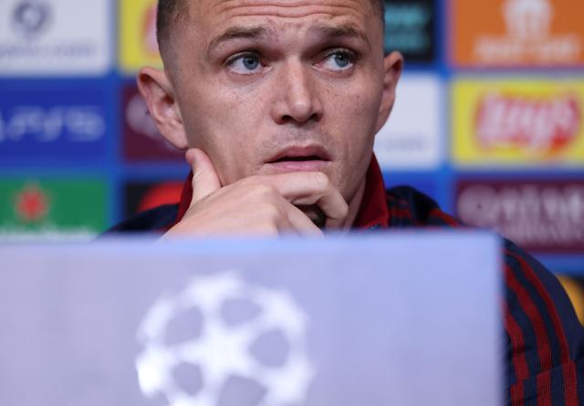 Newcastle United's English defender #02 Kieran Trippier gives a press conference on the eve of their UEFA Champions League last 16 second leg football match against FC Barcelona at the Camp Nou stadium in Barcelona, on March 17, 2026. (Photo by Lluis GENE / AFP)