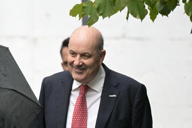 Argentina's Minister of Modernization, Federico Sturzenegger, attends a ceremony to commemorate the 34th anniversary of the bombing at the Israeli embassy in Buenos Aires that killed 29 people and wounded 200, at the Israeli Embassy Square in Buenos Aires on March 17, 2026. (Photo by JUAN MABROMATA / AFP)