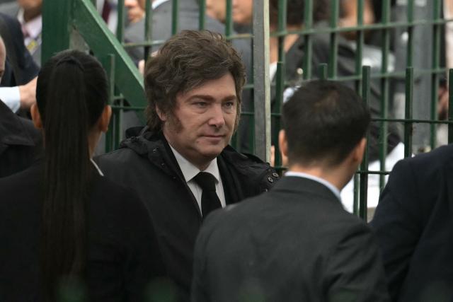 Argentina’s President Javier Milei arrives at a ceremony to commemorate the 34th anniversary of the bombing at the Israeli embassy in Buenos Aires that killed 29 people and wounded 200, at the Israeli Embassy Square in Buenos Aires on March 17, 2026. (Photo by JUAN MABROMATA / AFP)