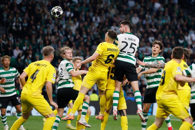 Sporting Lisbon's Portuguese defender #25 Goncalo Inacio heads the ball and scores the opening goal during the UEFA Champions League last 16 second leg football match between Sporting CP and Bodoe/Glimt at Jose Alvalade stadium in Lisbon on March 17, 2026. (Photo by FILIPE AMORIM / AFP)