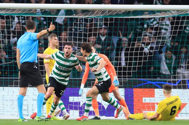 Sporting Lisbon's Portuguese defender #25 Goncalo Inacio (2L) celebrates scoring the opening goal during the UEFA Champions League last 16 second leg football match between Sporting CP and Bodoe/Glimt at Jose Alvalade stadium in Lisbon on March 17, 2026. (Photo by PATRICIA DE MELO MOREIRA / AFP)