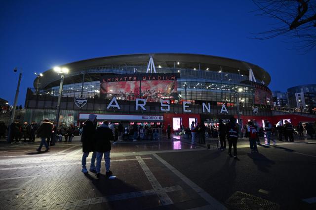 Fans arrive ahead of the UEFA Champions League, last 16 second leg football match between Arsenal and Bayer Leverkusen at the Emirates Stadium in north London on March 17, 2026. (Photo by Glyn KIRK / AFP)
