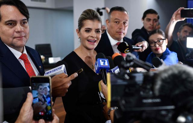 Costa Rica's Laura Fernandez speaks to the press after receiving the credentials as president at the Supreme Electoral Tribunal (TSE) in San Jose, Costa Rica, on March 17, 2026. Laura Fernandez will take office as president of Costa Rica on May 8, 2026. (Photo by Ezequiel BECERRA / AFP)