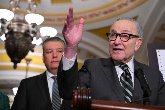 US Senate Minority Leader Chuck Schumer, Democrat of New York, speaks to the press after the weekly policy luncheon in Washington, DC on March 16, 2026. (Photo by ROBERTO SCHMIDT / AFP)