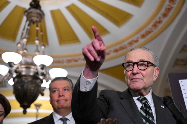 US Senate Minority Leader Chuck Schumer, Democrat of New York, speaks to the press after the weekly policy luncheon in Washington, DC on March 16, 2026. (Photo by ROBERTO SCHMIDT / AFP)