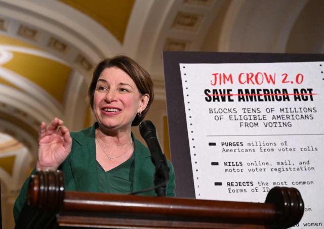 US Senator Amy Klobuchar, Democrat of Minnesota, speaks to the press after the weekly policy luncheon in Washington, DC, on March 16, 2026. (Photo by ROBERTO SCHMIDT / AFP)