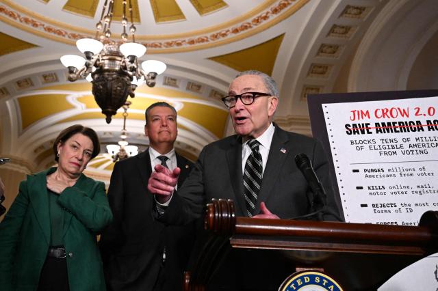 US Senate Minority Leader Chuck Schumer, Democrat of New York, speaks to the press after the weekly policy luncheon in Washington, DC on March 16, 2026. (Photo by ROBERTO SCHMIDT / AFP)