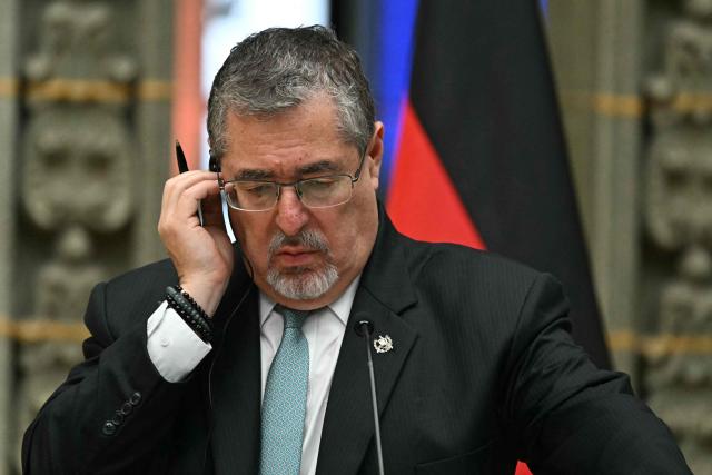 Guatemala's President Bernardo Arevalo listens while Germany's President Frank-Walter Steinmeier (out of frame) speaks during a press conference at the Culture Palace in Guatemala City on March 17, 2026. (Photo by JOHAN ORDONEZ / AFP)