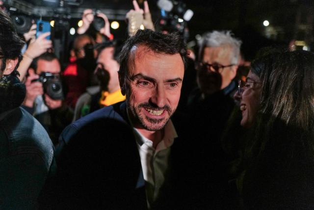 Lyon's outgoing mayor Gregory Doucet takes part in a gathering at Place Louis Pradel as part of the campaign for the municipal elections in Lyon on March 17, 2026. (Photo by OLIVIER CHASSIGNOLE / AFP)