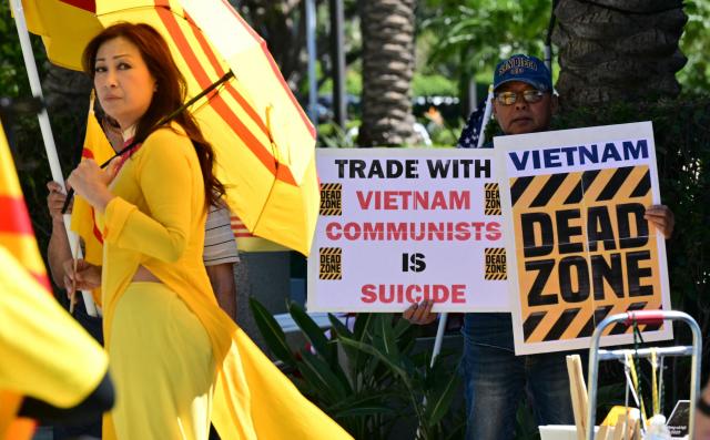 Members of the US-Vietnamese community protest a Vietnamese Communist investment conference at the Anaheim Convention Center in Anaheim, California, on March 17, 2026, opposing trade with Vietnam until basic human rights are respected. (Photo by Frederic J. Brown / AFP)