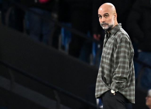 Manchester City's Spanish manager Pep Guardiola reacts during the UEFA Champions League, round of 16 second leg football match between Manchester City and Real Madrid at the Etihad Stadium in Manchester, north west England, on March 17, 2026. (Photo by Paul ELLIS / AFP)