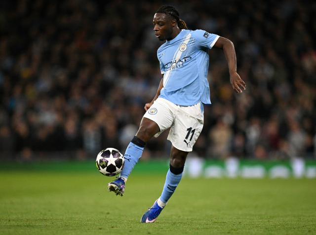 Manchester City's Belgian midfielder #11 Jeremy Doku controls the ball during the UEFA Champions League, round of 16 second leg football match between Manchester City and Real Madrid at the Etihad Stadium in Manchester, north west England, on March 17, 2026. (Photo by Oli SCARFF / AFP)