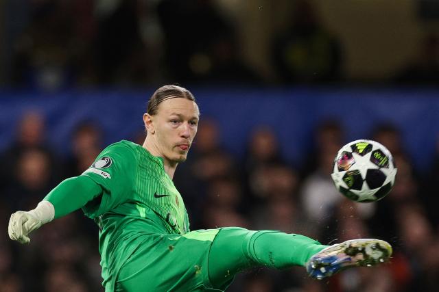 Paris Saint-Germain's Russian goalkeeper #39 Matvey Safonov shoots the ball during the UEFA Champions League round of 16 second leg football match between Chelsea FC and Paris Saint-Germain (PSG) at Stamford Bridge, west London on March 17, 2026. (Photo by Adrian Dennis / AFP)
