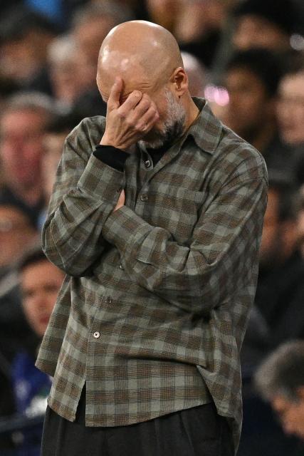 Manchester City's Spanish manager Pep Guardiola gestures on the touchline during the UEFA Champions League, round of 16 second leg football match between Manchester City and Real Madrid at the Etihad Stadium in Manchester, north west England, on March 17, 2026. (Photo by Oli SCARFF / AFP)