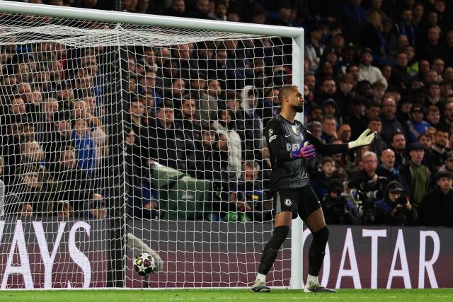 Chelsea's Spanish goalkeeper #01 Robert Sanchez reacts after Paris Saint-Germain scored a third goal during the UEFA Champions League round of 16 second leg football match between Chelsea FC and Paris Saint-Germain (PSG) at Stamford Bridge, west London on March 17, 2026. (Photo by Adrian Dennis / AFP)
